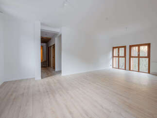Discover this stunning property featuring a bright and airy interior with beautiful wooden floors.