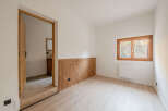 This inviting room showcases a blend of natural elements and modern design.