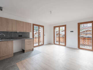 Discover this stunning property featuring a modern kitchen with sleek cabinetry and a stylish backsplash.