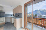Discover the charm of this stunning property, featuring a modern kitchen with ample storage and sleek countertops.