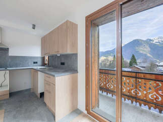 Discover the charm of this stunning property, featuring a modern kitchen with ample storage and sleek countertops.
