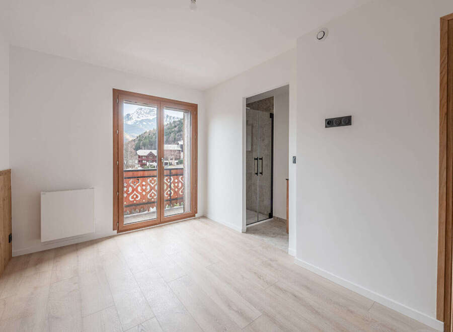 This stunning property boasts a bright and airy interior with beautiful wooden floors.
