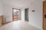 This stunning property boasts a bright and airy interior with beautiful wooden floors.