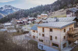 Discover the charm of this stunning mountain property, boasting exquisite wooden architecture and breathtaking views.