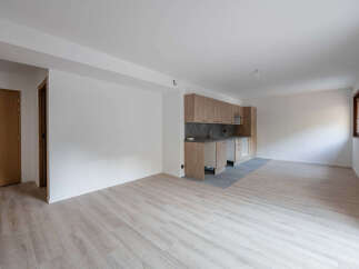 Discover this bright and airy property, featuring a modern kitchen with ample storage and sleek design.