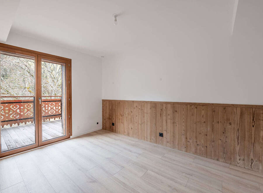 Discover the charm of this inviting property, featuring a bright interior with natural light streaming through large windows.