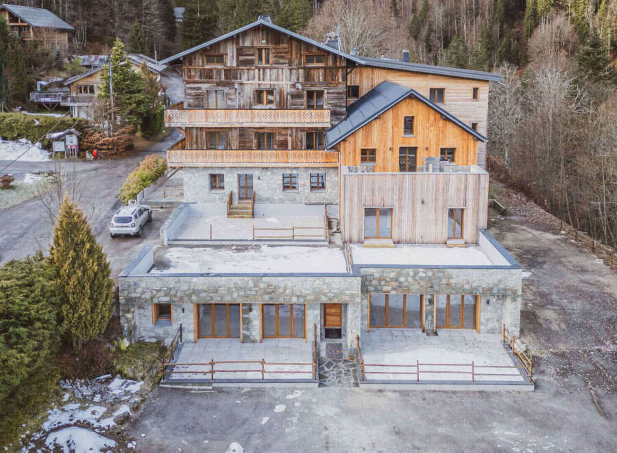 Discover the charm of this stunning property, boasting a unique blend of stone and wood architecture.