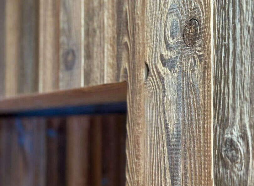 This property showcases exquisite craftsmanship with its stunning wooden paneling.