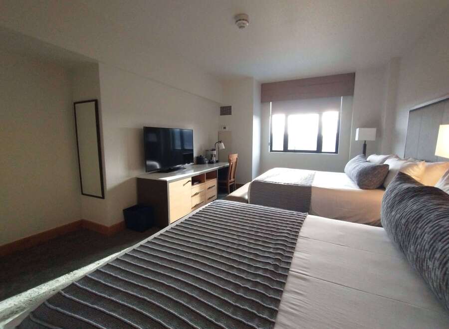 Experience comfort and style in this inviting hotel room.