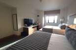 Experience comfort and style in this inviting hotel room.