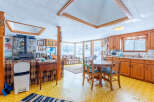 This cozy home features a unique layout with a wood-burning fireplace, perfect for chilly evenings.