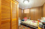 Discover the charm of this cozy space, perfect for a guest room or a personal retreat.