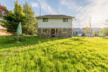 Discover this charming property featuring a unique stone and siding exterior, perfect for a cozy retreat.