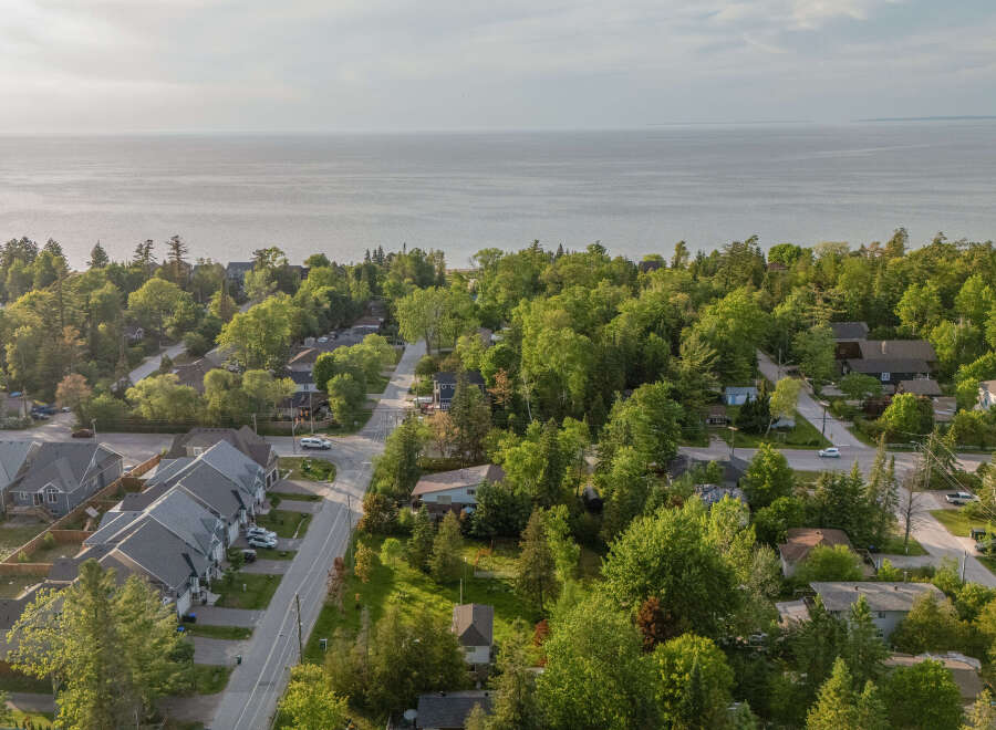 Discover this charming residential neighborhood nestled amongst lush greenery, offering a serene escape with proximity to the water.