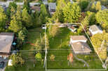 Discover this expansive property offering ample space for outdoor enjoyment and potential expansion.