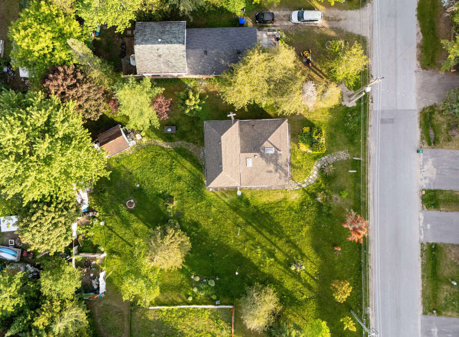 Discover this charming property featuring a well-maintained house with a spacious yard, perfect for outdoor activities.