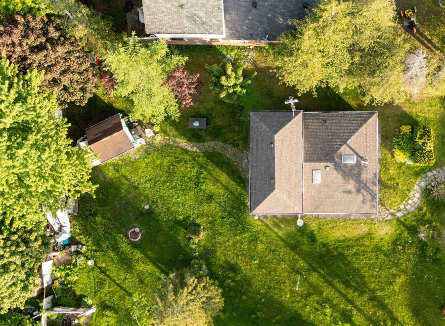Discover this charming property featuring a spacious backyard perfect for outdoor activities and relaxation.