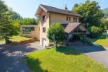 This stunning property boasts a modern design with a touch of rustic charm, perfect for those seeking a tranquil retreat.