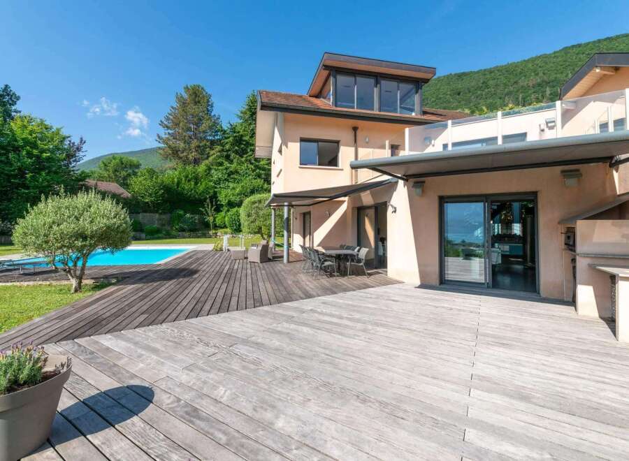 This stunning property boasts a luxurious outdoor space, perfect for entertaining or relaxing.