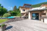 This stunning property boasts a luxurious outdoor space, perfect for entertaining or relaxing.