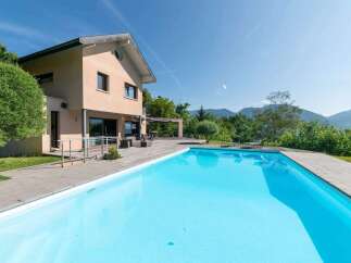 Experience luxury living in this stunning property featuring a private pool and breathtaking mountain views.