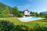 Discover your dream home with this stunning property! Featuring a beautiful swimming pool, a spacious lawn, and a modern design, this house offers the perfect blend of luxury and comfort.