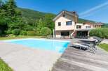 This stunning property boasts a luxurious outdoor space, perfect for relaxation and entertainment.