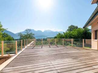 Enjoy breathtaking mountain and lake views from this stunning property.