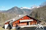 Discover a stunning chalet nestled in the heart of the mountains, offering breathtaking views and a serene atmosphere.