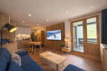 Experience the charm of this cozy ski apartment, perfect for a mountain getaway.