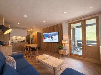 Experience the charm of this cozy ski apartment, perfect for a mountain getaway.