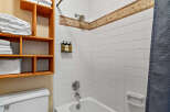 Step into a clean and inviting bathroom space.