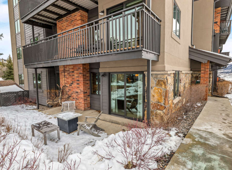 Discover the charm of this stunning property featuring a beautiful balcony and inviting outdoor seating.