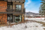 This stunning property boasts a prime location with breathtaking mountain views, perfect for a winter getaway.