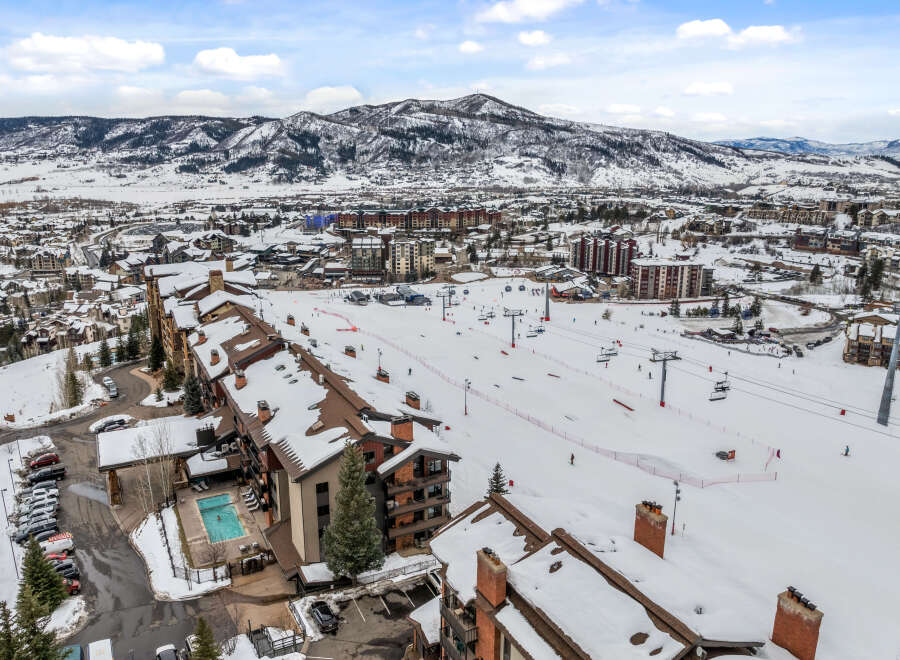 Experience luxury living in this stunning ski-in/ski-out property, offering unparalleled access to world-class slopes.