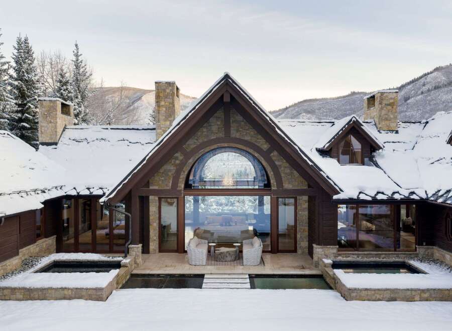 This stunning mountain home showcases exquisite architecture and design, perfect for a luxurious retreat.