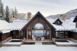 This stunning mountain home showcases exquisite architecture and design, perfect for a luxurious retreat.