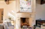Experience luxury living in this stunning property featuring a cozy fireplace, perfect for creating a warm and inviting atmosphere.