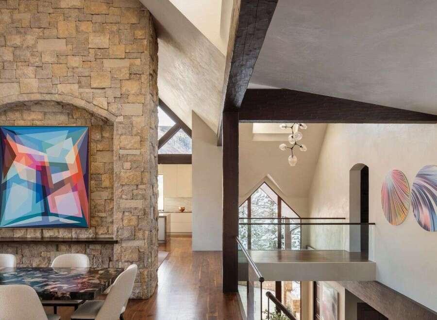 This stunning property boasts a seamless blend of modern design and natural elements.