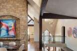 This stunning property boasts a seamless blend of modern design and natural elements.