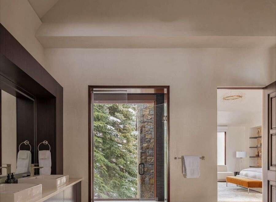 Step into a luxurious bathroom retreat, where modern design meets natural beauty.