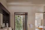 Step into a luxurious bathroom retreat, where modern design meets natural beauty.