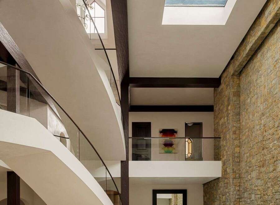 Experience luxury living in this stunning property featuring a unique architectural design.