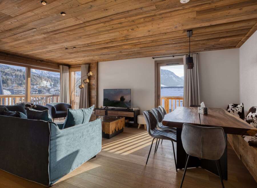 Experience luxury living in this stunning property featuring a cozy living room with a modern design.