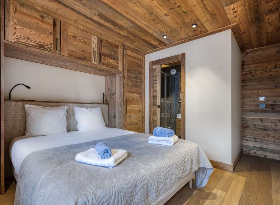 Experience rustic elegance in this stunning bedroom.