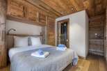 Experience rustic elegance in this stunning bedroom.