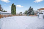This property offers a serene winter landscape, perfect for those who appreciate the beauty of the season.