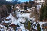 Discover the charm of this stunning mountain property, nestled in a picturesque winter wonderland.