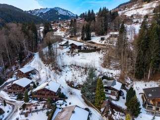 Discover the charm of this stunning mountain property, nestled in a picturesque winter wonderland.