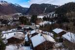 Nestled in a picturesque mountain setting, this charming property offers a serene escape.